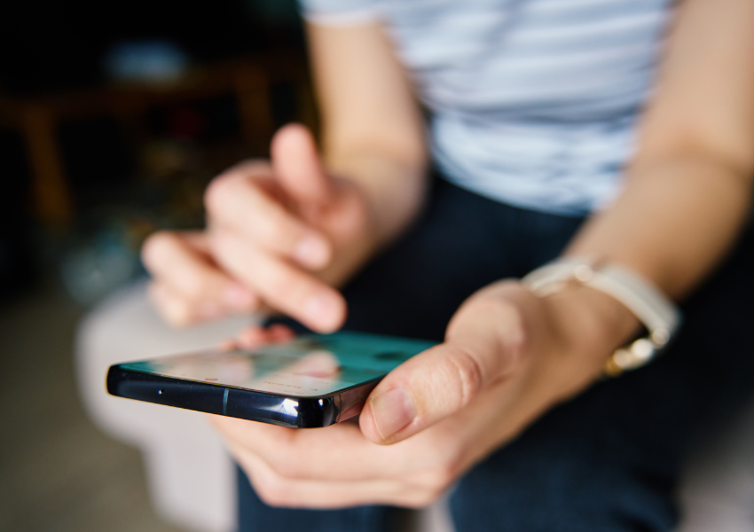 Person using a smartphone with fast mobile Internet speeds for smooth browsing, app usage, and instant online access.