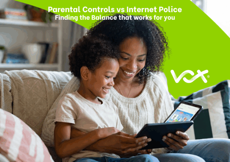 Parent and child using a tablet together at home for safe internet use