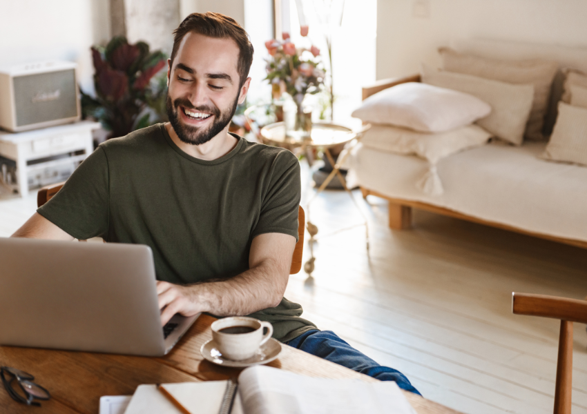 A man works from home at his desk, symbolising the shift in work or office culture