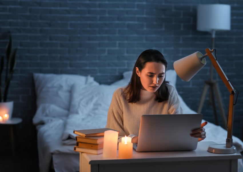 Woman working in the dark using Fibre